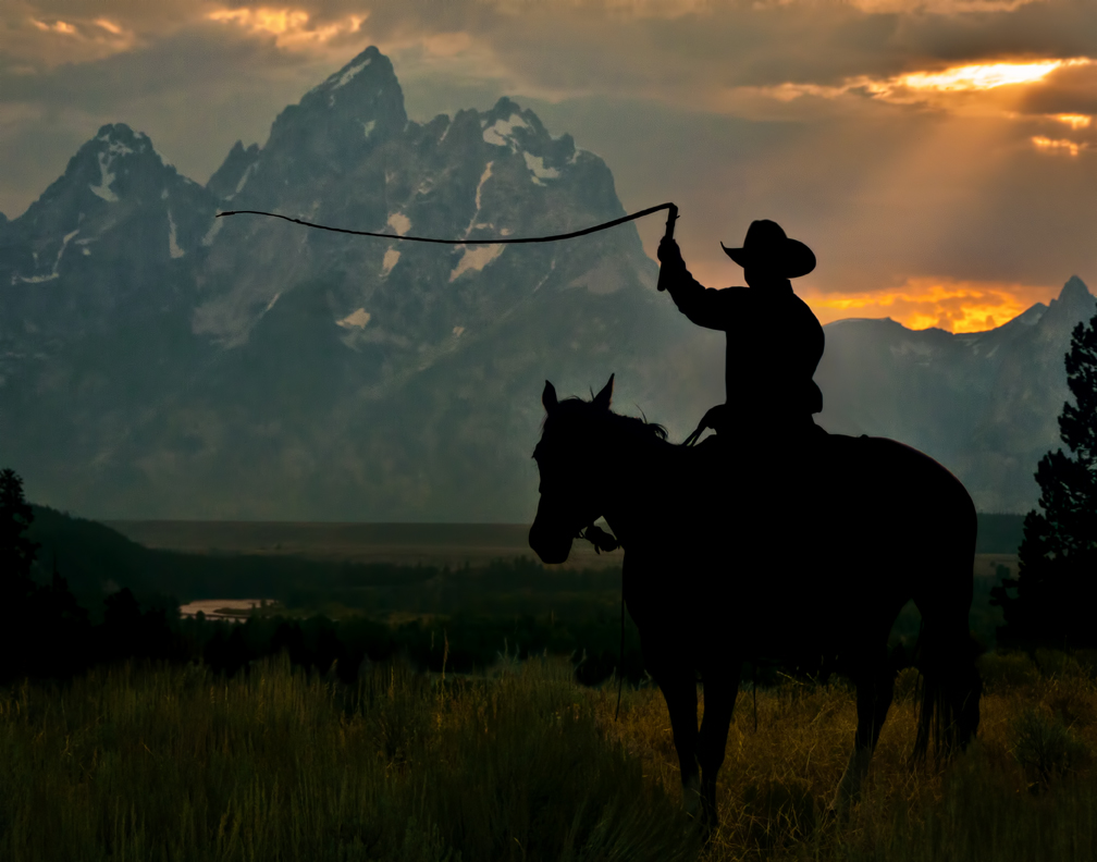 Cowboy Silhouette on the Tetons_5325_Light sky_web.jpg