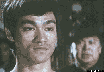 Funny-gif-Bruce-Lee-laughing.png