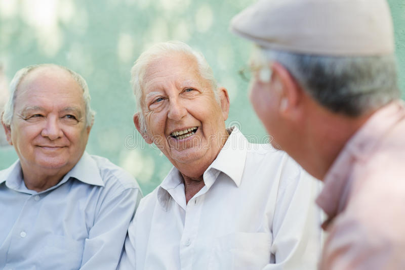 group-happy-elderly-men-laughing-talking-25534393.jpg