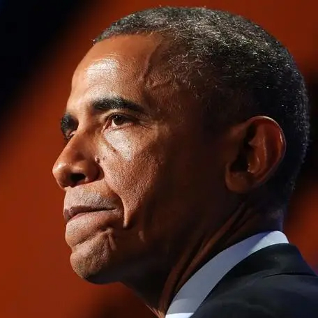 Obama side view pursed lips.jpg