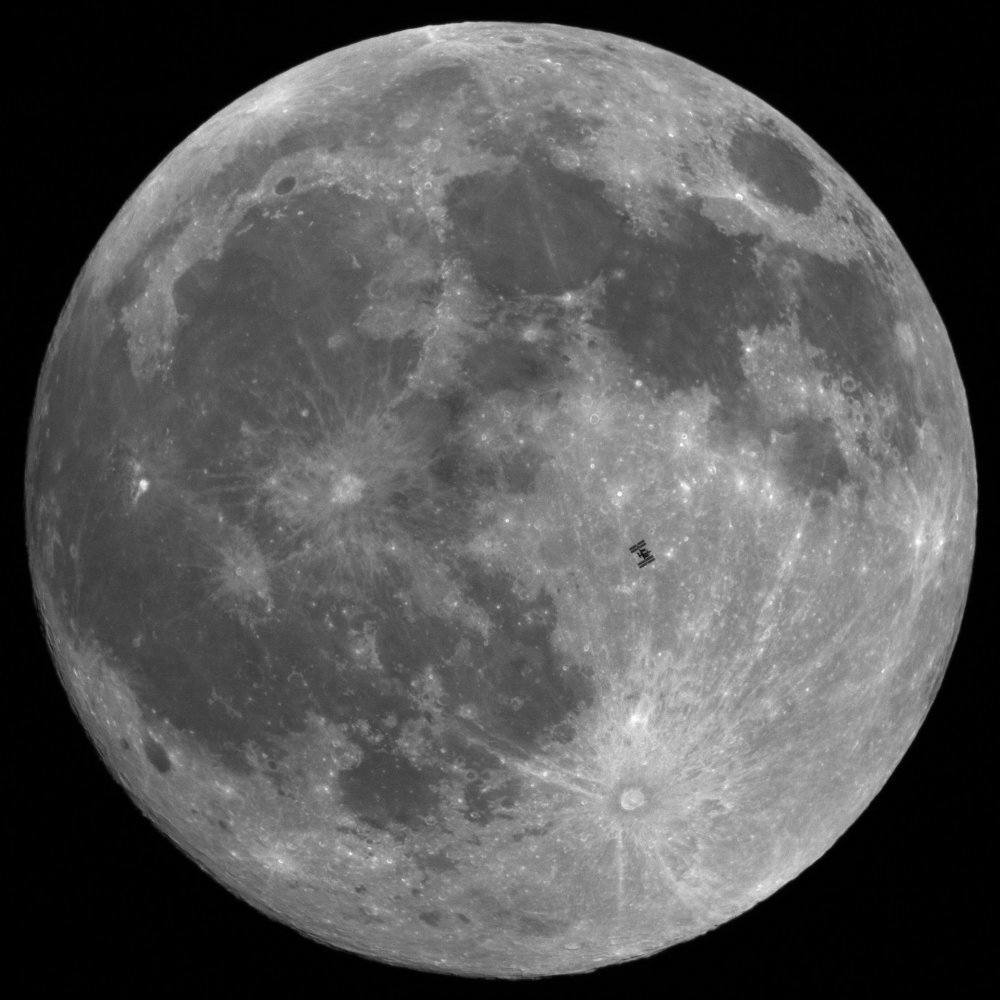 The International Space Station in front of the full moon.jpg