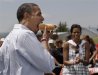 2011-08-23-15-51-51-2-barack-obama-eats-a-hot-dog-at-an-independence-day.jpeg