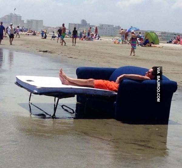 funny-man-sleeping-on-couch-on-beach-bajiroo.jpg