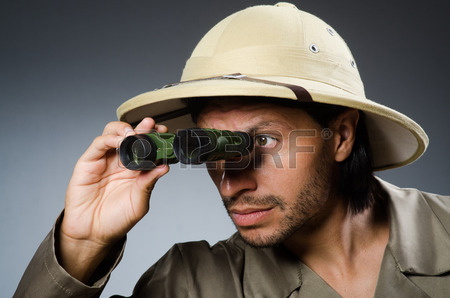 37064249-funny-safari-hunter-against-background.jpg