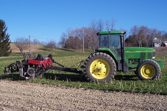 john_deere_tractor_with_subsoiler.jpg