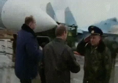 OAY9KFtTmefWcFaMYlIv_Putin%20Handshake.gif
