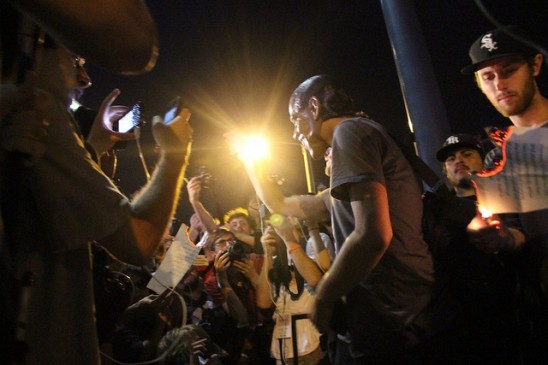 occupy_dnc_mask_burning-548x365.jpg